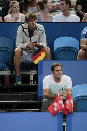 6th January 2018, Perth Arena, Perth, Australia; MasterCard Hopman Cup Tennis Final; Roger Federer of Team Switzerland and Alexander Zverev of Team Germany watch the womens Final between Angelique Kerber of Team Germany and Belinda Bencic of Team Switzerland Kerber won 2 sets to 0  ActionPlus11968582