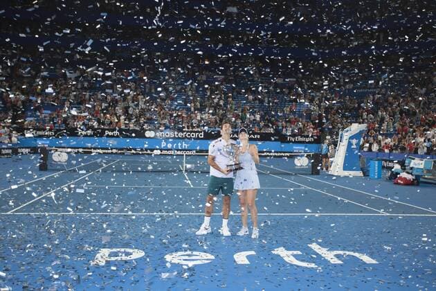 6th January 2018, Perth Arena, Perth, Australia; MasterCard Hopman Cup Tennis Final; Winners Roger Federer and Belinda Bencic of Team Switzerland pose with the Hopman Cup after they defeated Germany in the Final  ActionPlus11968646
