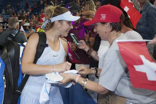 6th January 2018, Perth Arena, Perth, Australia; MasterCard Hopman Cup Tennis Final; Belinda Bencic of Team Switzerland signs autographs with fans after she won the Hopman Cup with Partner Roger Federer  ActionPlus11968654