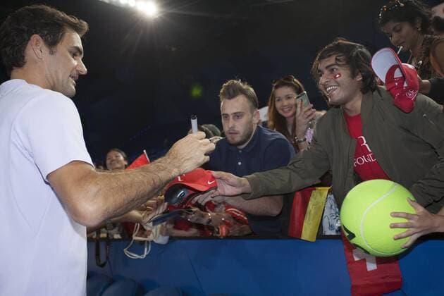 6th January 2018, Perth Arena, Perth, Australia; MasterCard Hopman Cup Tennis Final; Roger Federer signs autographs for fans after he won the Hopman Cup with Partner Belinda Bencic  ActionPlus11968661