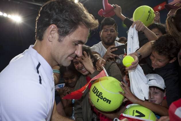 6th January 2018, Perth Arena, Perth, Australia; MasterCard Hopman Cup Tennis Final; Roger Federer signs autographs for fans after he won the Hopman Cup with Partner Belinda Bencic  ActionPlus11968663