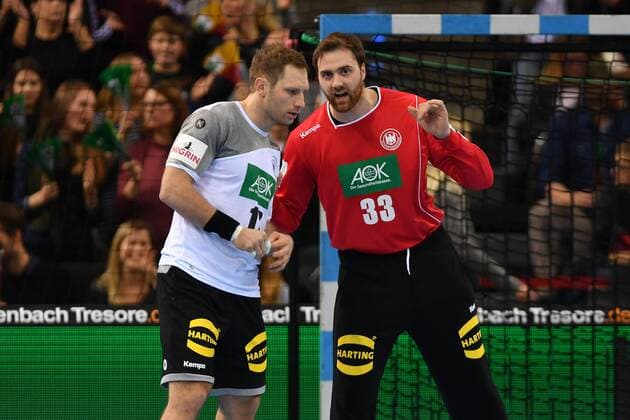 v li Steffen WEINHOLD GER in conversation with Andreas WOLF goalkeeper GER action handball match Germany Iceland on 05 01 2018 P O R S C H E A R E N A Stuttgart