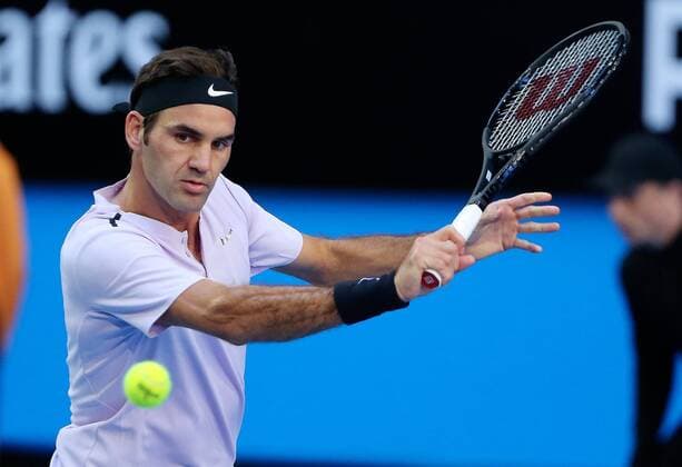 (180107) -- PERTH, Jan. 7, 2018 -- Roger Federer of Switzerland hits a return during the final against Alexander Zrevev of Germany at Hopman Cup mixed teams tennis tournament in Perth, Australia, on Jan. 6, 2018. Switzerland claimed the title with 2-1. ) (SP)AUSTRALIA-PERTH-TENNIS-HOPMAN CUP ZhouxDan 
