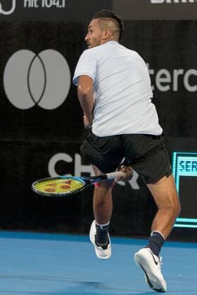 SYDNEY, NSW - JANUARY 8: Nick Kyrgios (AUS) hits the ball between his legs at the FAST4 Tennis Showdown game between Alexander Zverev (GER) and Nick Kyrgios (AUS) on Ken Rosewall Arena at The Sydney Tennis Centre in Sydney on January 08, 2018. (Photo by Steven Markham Icon Sportswire) TENNIS: JAN 08 The FAST4 Tennis Tournament Showdown Icon18010800994 EDITORIAL USE ONLY