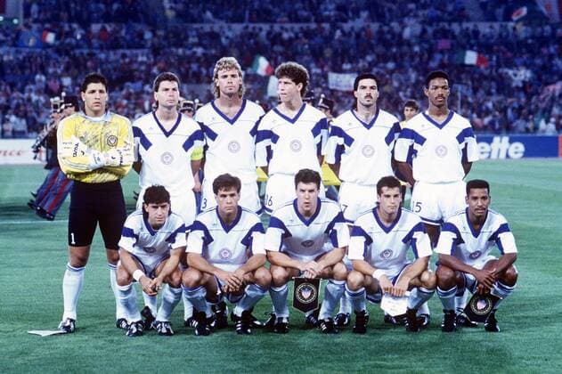 SQUADRA: TONY MEOLA, MICHAEL WINDISCHMANN, JOHN DOYLE, BRUCE MURRAY, MARCELO BALBOA, DESMOND ARMSTRONG; TAB RAMOS, PAUL CALIGIURI, PETER VERMES, JOHN HARKES, JIMMY BANKS CAMPIONATI MONDIALI ITALIA 1990 ITALIA-USA STATI UNITI 1-0