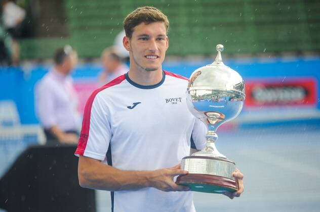 12th January 2018, Kooyong Lawn Tennis Club, Kooyong, Melbourne, Australia; Priceline Pharmacy Kooyong Classic tennis tournament; Pablo Carreno Busta of Spain shows off his trophy after defeating Matt Ebden of Australia in the Kooyong Classic final  ActionPlus11970985