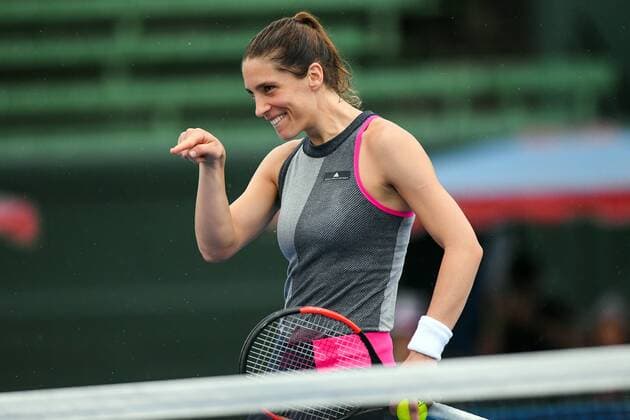 12th January 2018, Kooyong Lawn Tennis Club, Kooyong, Melbourne, Australia; Priceline Pharmacy Kooyong Classic tennis tournament; Andrea Petkovic of Germany dances to pass time as the rain delays take hold during her final against Belinda Bencic of Switzerland  ActionPlus11971024
