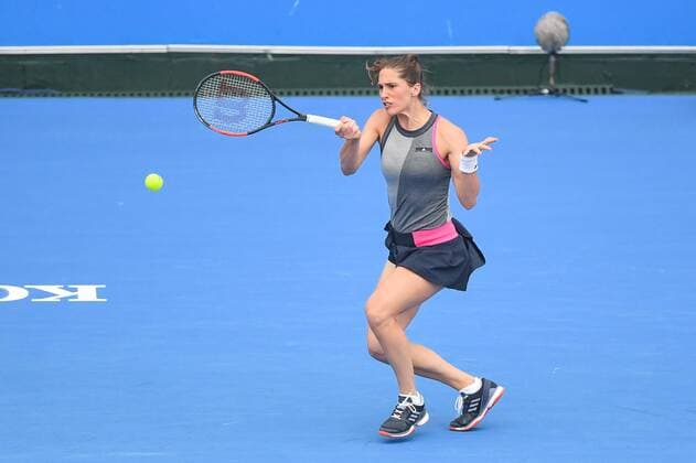 12th January 2018, Kooyong Lawn Tennis Club, Kooyong, Melbourne, Australia; Priceline Pharmacy Kooyong Classic tennis tournament; Andrea Petkovic of Germany returns the ball to Belinda Bencic of Switzerland during the Women s Kooyong Classic final  ActionPlus11971029