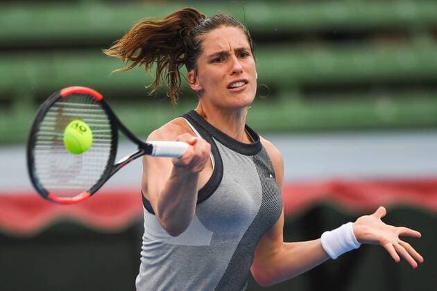12th January 2018, Kooyong Lawn Tennis Club, Kooyong, Melbourne, Australia; Priceline Pharmacy Kooyong Classic tennis tournament; Andrea Petkovic of Germany returns the ball to Belinda Bencic of Switzerland during the Women s Kooyong Classic final  ActionPlus11971034
