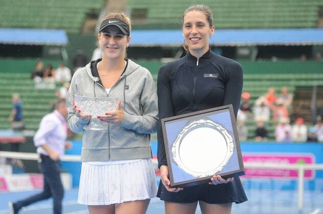 12th January 2018, Kooyong Lawn Tennis Club, Kooyong, Melbourne, Australia; Priceline Pharmacy Kooyong Classic tennis tournament; Belinda Bencic of Switzerland and Andrea Petkovic of Germany smile with their trophies after the final of the Kooyong Classic Women s final  ActionPlus11971039