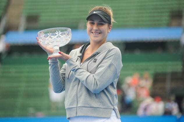 12th January 2018, Kooyong Lawn Tennis Club, Kooyong, Melbourne, Australia; Priceline Pharmacy Kooyong Classic tennis tournament; Belinda Bencic of Switzerland smiles with her trophy after defeating Andrea Petkovic of Germany in the Kooyong Classic Women s final  ActionPlus11971041