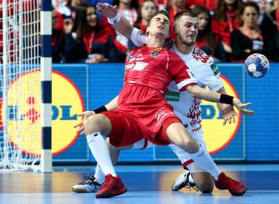 12.01.2018., Croatia, Zatika Sports Hall, Porec - European Handball Championship, Group B, 1st Round, Belarus - Austria. Lukas Herburger, Artsem Karalek.  IgorxKralj PIXSELL