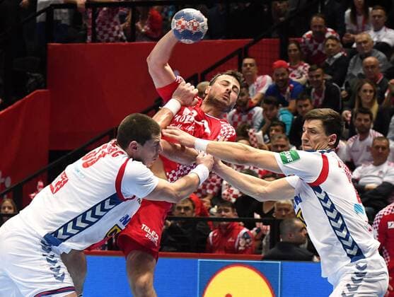 Split Croatia Spaladium arena 12 1 2018 men handball European Championship 2018 Croatia Serbia DUVNJAK Domagoj CRO between Mijajlo MARSENIC SEB li and Nemanja ZELENOVIC SEB