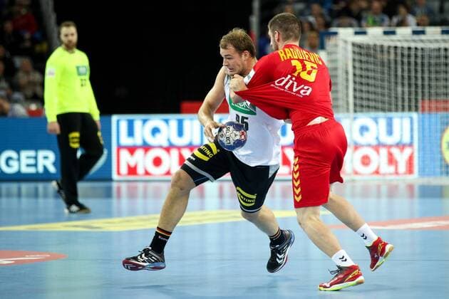 HANDBALL - EHF EURO 2018, GER vs MNE ZAGREB,CROATIA,13.JAN.18 - HANDBALL - EHF European Championship EM Europameisterschaft group stage, Germany vs Montenegro. Image shows Paul Drux (GER) and Igor Radojevic (MNE). GEPAxpictures xMaticxKlansek