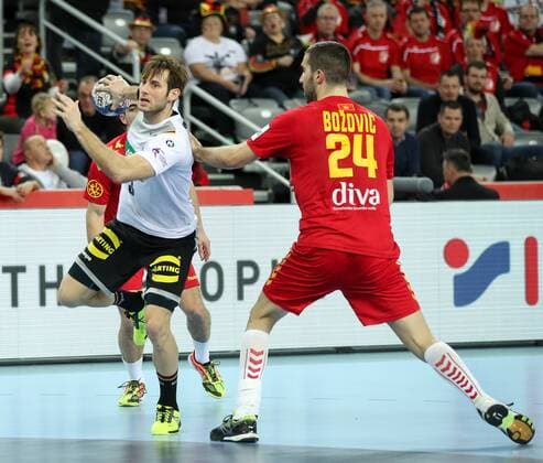 HANDBALL - EHF EURO 2018, GER vs MNE ZAGREB,CROATIA,13.JAN.18 - HANDBALL - EHF European Championship EM Europameisterschaft group stage, Germany vs Montenegro. Image shows Uwe Gensheimer (GER) and Milos Bozovic (MNE). GEPAxpictures xMaticxKlansek