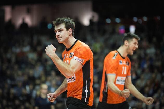 Berlin Germany 14 01 2018 Pierre Pujol BR volleys 18 and Adam White BR volleys 11 cheering at the game of volleyball between the Berlin Bundesliga recycling volleys and SWD power volleys Düren