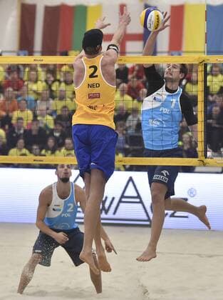 Robert Meeuwsen of Netherlands (front) and Bartosz Losiak, left, and Piotr Kantor of Poland in action during men Beach volleyball Beachvolleyball CEV European Championship EM Europameisterschaft Tour Masters final match in Pelhrimov, Czech Republic, Sunday, January 14, 2018. (CTKxPhoto LubosxPavlicek) CTKPhotoP201801140646001  PAV 15