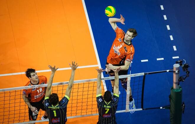 Berlin Germany 17 01 2018 Robert Kromm BR 3 volleys and Pierre Pujol BR volleys 18 against the block from Barthélemy Chinenyeze Toulouse 1 and Miguel Angel de Amo Toulouse 7 when playing the CEV volleyball Champions League group A between the Berlin recycling volleys and spacer s Toulouse VB