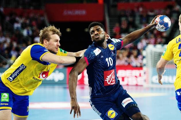 180120 Sweden s Max Darj defends against France s Ditching Mem during handball match between Sweden and France in Handball CHAMPIONSHIP January 20, 2018 2018 in Zagreb  Copyright: LUDVIGxTHUNMAN BB180120LT051