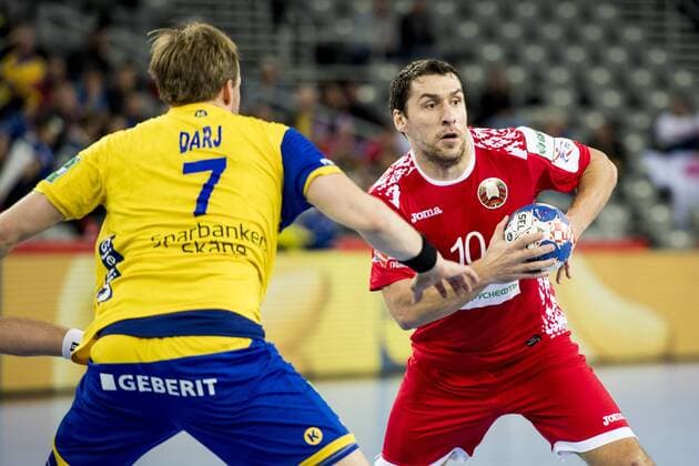 180122 Sweden s Max Darj and Belarus Barys Pukhouski in handball game between Sweden and Russia during Handball CHAMPIONSHIPS on 22 January 2018 2018 in Zagreb  Copyright: LUDVIGxTHUNMAN BB180122LT045