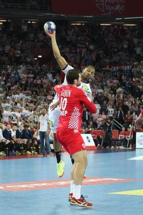 24th January 2018, Arena Zagreb, Zagreb, Croatia; 2018 European Mens Handball Championship, Croatia versus France; Nicola Claire (France) shoots over Jakov Gojum (Ser)  ActionPlus11976891