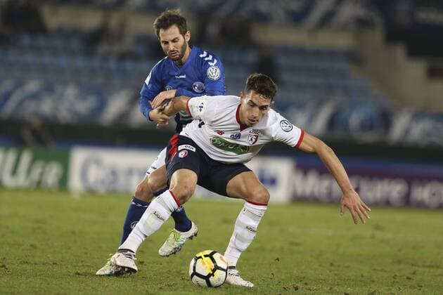 January 25, 2018 - Strasbourg, France - Vincent Nogueira of Racing Strasbourg 5 vies Ponce Martinez Ezequiel of Lilla 9 during the French Cup football match between Strasbourg and Lille on January 25, 2018 at the Meinau stadium in Strasbourg, eastern France. Racing Strasbourg v Lille - French National Cup  - ZUMAn230 20180125_zaa_n230_291 Copyright: xElyxandroxCegarrax