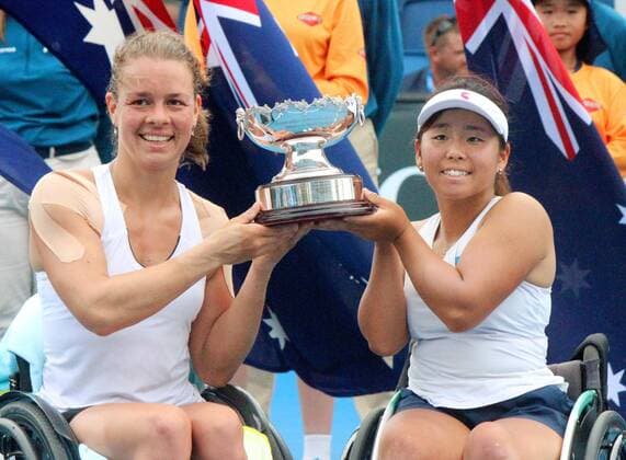 Kamiji, Buis win wheelchair doubles title at Australian Open Japan s Yui Kamiji (R) and the Netherlands Marjolein Buis hold their trophy after beating the Dutch duo of Diede de Groot and Aniek Van Koot in the Australian Open women s wheelchair doubles final in Melbourne, Australia, on Jan. 26, 2018. 