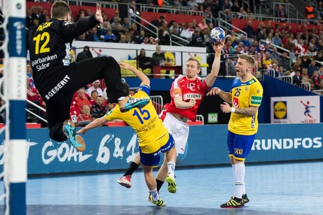 180126 Sveriges malvakt Andreas Palicka Hampus Wanne and Linus A.b defends against Denmark s Peter Balling Christensen during the semi-final between Sweden and Denmark in the European Handball CHAMPIONSHIP January 26, 2018 2018 in Zagreb  Copyright: FREDRIKxVARFJELL BB180126FV062