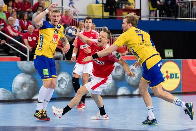 180126 Sweden s Linus A.b and Max Darj defends against Denmark s Morten Toft Olsen during the semi-final between Sweden and Denmark in the European Handball CHAMPIONSHIP January 26, 2018 2018 in Zagreb  Copyright: FREDRIKxVARFJELL BB180126FV097