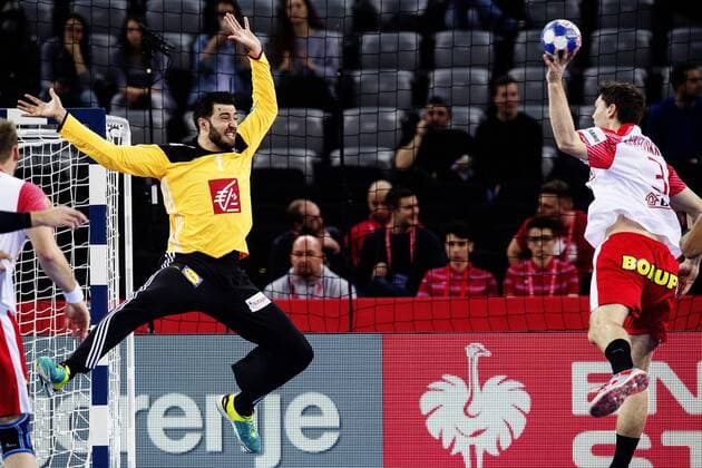 Niclas 180128 Kirkelokke Denmark malvakt France pushes against Cyril Dumoulin during the bronze medal match between Denmark and France in Handball CHAMPIONSHIP 2018 28 January 2018 in Zagreb  Copyright: FREDRIKxVARFJELL BB180128FV009