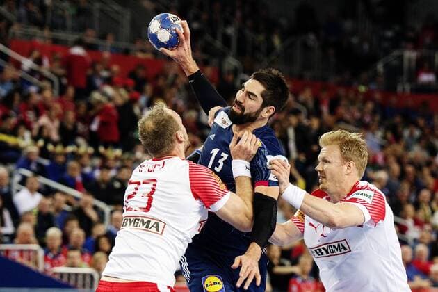 180128 Denmark s Henrik Toft Hansen and Anders Zachariassen defends against France s Nikola Karabatic in the bronze game between Denmark and France in Handball CHAMPIONSHIP 2018 28 January 2018 in Zagreb  Copyright: FREDRIKxVARFJELL BB180128FV014