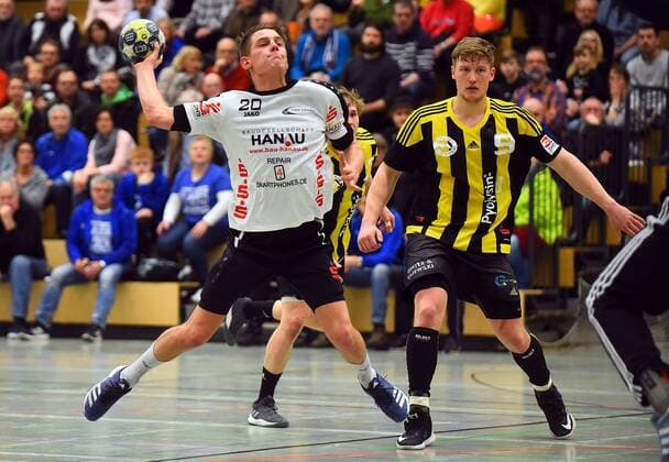 28 01 2018 xpsx 3 handball League HSG Hanau SV Anhalt Bernburg v l Marius Brüggemann Hanau Tim Ackermann Bernburg Hanau, Hessen Germany
