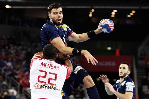 180128 French Nedim Remili in battle with Denmark s Mads Mensah Larsen during the bronze game between Denmark and France in Handball CHAMPIONSHIP 2018 28 January 2018 in Zagreb  Copyright: FREDRIKxVARFJELL BB180128FV021