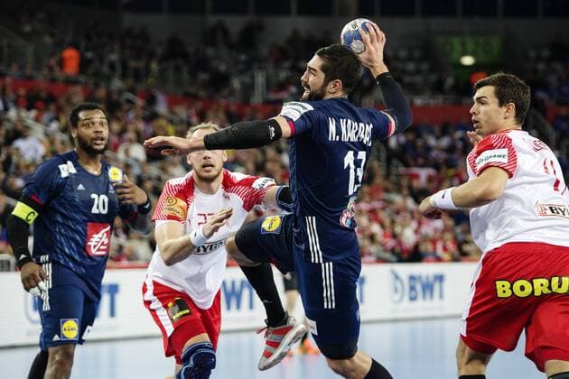 180128 Denmark s Henrik Toft Hansen, Rasmus L. Schmidt defends against France s Nikola Karabatic who shoots during the bronze game between Denmark and France in Handball CHAMPIONSHIP 2018 28 January 2018 in Zagreb  Copyright: FREDRIKxVARFJELL BB180128FV046