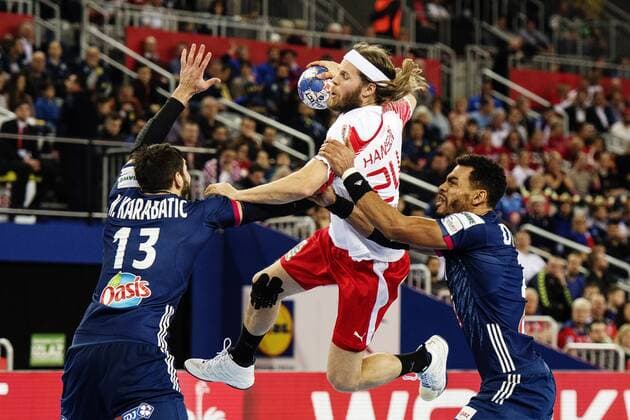180128 France s Nikola Karabatic and Adrien Dipanda defends against Denmark s Mikkel Hansen in the bronze game between Denmark and France in Handball CHAMPIONSHIP 2018 28 January 2018 in Zagreb  Copyright: FREDRIKxVARFJELL BB180128FV051