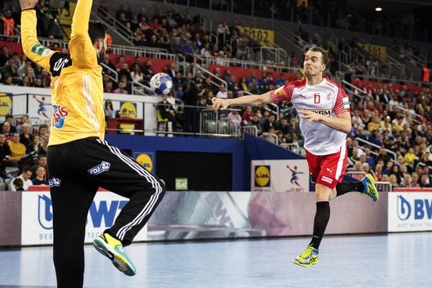 180128 French malvakt Cyril Dumoulin father a shot from Denmark s Casper U Mortensen in the bronze game between Denmark and France in Handball CHAMPIONSHIP 2018 28 January 2018 in Zagreb  Copyright: FREDRIKxVARFJELL BB180128FV053