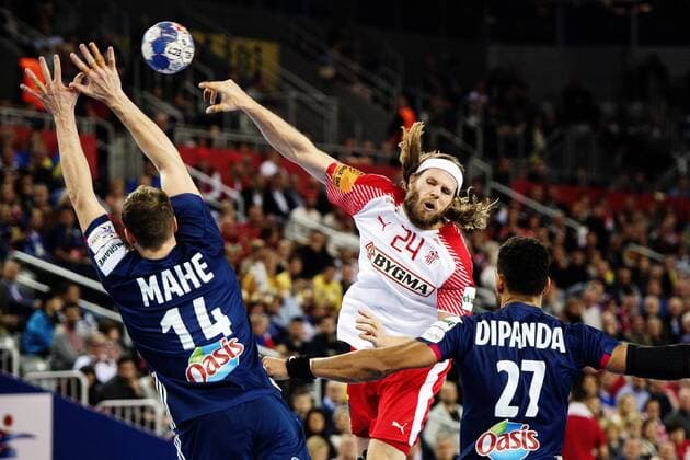 180128 French Kentin Mahe and Adrien Dipanda defends against pushing Denmark s Mikkel Hansen in the bronze game between Denmark and France in Handball CHAMPIONSHIP 2018 28 January 2018 in Zagreb  Copyright: FREDRIKxVARFJELL BB180128FV056