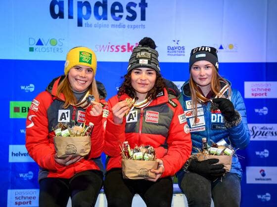 ALPINE SKIING - FIS Alpine Junior World Ski Championships DAVOS,SWITZERLAND,31.JAN.18 - ALPINE SKIING - FIS Alpine Junior World Ski Championships Davos 2018, award ceremony, giant slalom, ladies. Image shows the podium: Katharina Liensberger, Luca Tanner (AUT) and Riikka Honkanen (FIN). GEPAxpictures xOliverxLerch