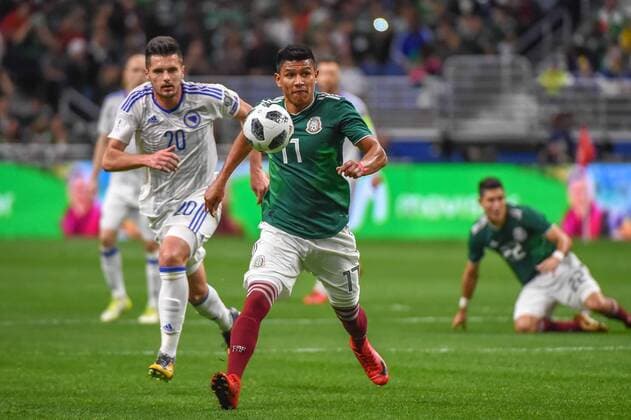 SAN ANTONIO, TX - JANUARY 31: Mexico defender Jesus Gallardo (17) and Bosnia and Herzegovina midfielder Goran Zakaric (20) chase a loose ball during first half action during the soccer match between Mexico and Bosnia & Herzegovina on January 31, 2018 at the Alamodome in San Antonio, Texas. (Photo by Ken Murray Icon Sportswire) SOCCER: JAN 31 Mexico v Bosnia & Herzegovina Icon180131003 EDITORIAL USE ONLY
