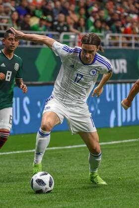 SAN ANTONIO, TX - JANUARY 31: Bosnia and Herzegovina forward Mersudin Ahmetovic (17) attempts to maintain ball control during the soccer match between Mexico and Bosnia & Herzegovina on January 31, 2018 at the Alamodome in San Antonio, Texas. (Photo by Ken Murray Icon Sportswire) SOCCER: JAN 31 Mexico v Bosnia & Herzegovina Icon180131010 EDITORIAL USE ONLY