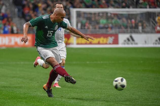 SAN ANTONIO, TX - JANUARY 31: Mexico defender Luis Rodriguez (15) centers the ball during the soccer match between Mexico and Bosnia & Herzegovina on January 31, 2018 at the Alamodome in San Antonio, Texas. (Photo by Ken Murray Icon Sportswire) SOCCER: JAN 31 Mexico v Bosnia & Herzegovina Icon180131023 EDITORIAL USE ONLY
