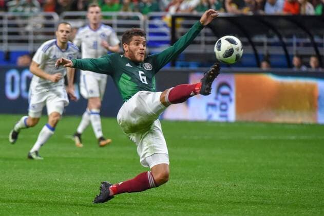 SAN ANTONIO, TX - JANUARY 31: Mexico midfielder Jonathan Dos Santos (6) attempts to deflect a shot during second half action during the soccer match between Mexico and Bosnia & Herzegovina on January 31, 2018 at the Alamodome in San Antonio, Texas. (Photo by Ken Murray Icon Sportswire) SOCCER: JAN 31 Mexico v Bosnia & Herzegovina Icon180131025 EDITORIAL USE ONLY