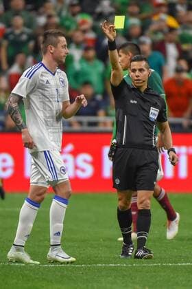 SAN ANTONIO, TX - JANUARY 31: Bosnia and Herzegovina defender Almir Bekic (2) receives a yellow card from the official during second half action during the soccer match between Mexico and Bosnia & Herzegovina on January 31, 2018 at the Alamodome in San Antonio, Texas. (Photo by Ken Murray Icon Sportswire) SOCCER: JAN 31 Mexico v Bosnia & Herzegovina Icon180131033 EDITORIAL USE ONLY