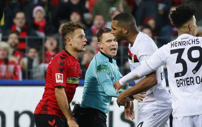 Freiburg football Federal League Hoffenheim vs Bayer Leverkusen left Amir Abrashi Freiburg referee Robert Kampka Jonathan Tah Leverkusen