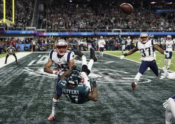 New England Patriots cornerback Eric Rowe (25) blocks an attempted touchdown reception by Philadelphia Eagles wide receiver Alshon Jeffery (17) during the first half of Super Bowl LII at U.S. Bank Stadium in Minneapolis, Minnesota on February 4, 2018. The Eagles will be seeking their first title while the Patriots will be after their sixth Super Bowl win.  SBP20180204806 BRIANxKERSEY