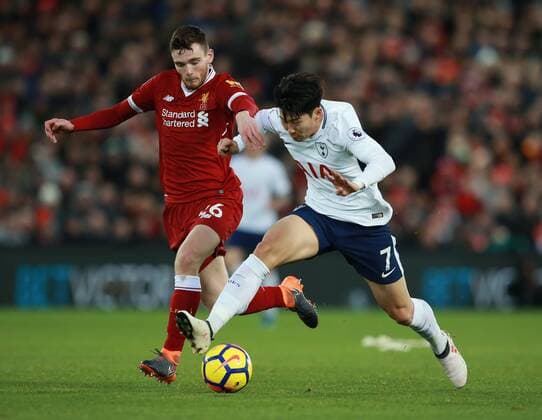 Andrew Robertson of Liverpool in action with Son Heung-Min of Tottenham during the premier league match at Anfield Stadium, Liverpool. Picture date 4th February 2018. Picture credit should read: Simon Bellis Sportimage EDITORIAL USE ONLY. No use with unauthorised audio, video, data, fixture lists, club league logos or live services. Online in-match use limited to 120 images, no video emulation. No use in betting, games or single club league player publications.