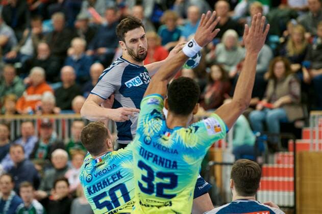 Potsdam 07 03 2018 MBS arena Sports Park airship port handball EHF Cup second round Füchse BERLIN agai St Raphael Var FRA 21 26 fltr Artsjom KARALEK 50 St Raphael Adrien DIPANDA 32 St Raphael Marko KOPLJAR 35 foxes