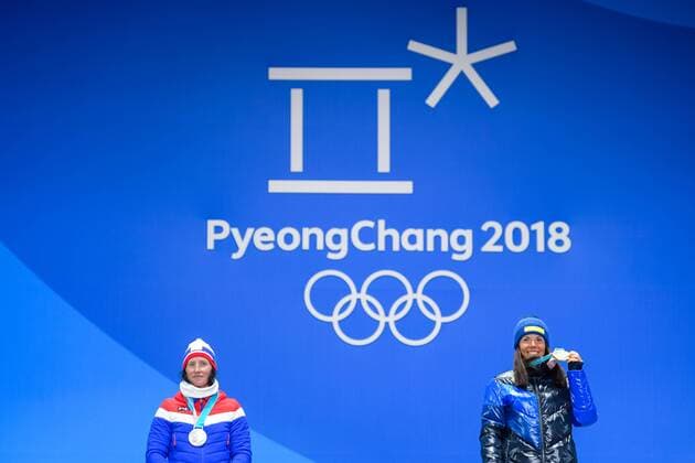 180210 Silver medalist Marit Bj ¿color of Norway and gold medalist Charlotte Kalla of Sweden at the medal ceremony for the Women s Team Sprint during the 2018 Winter Olympics on February 10 2018 in Pyeongchang Photo Jon Olav Nesvold BILDBYR N code JE 160152ö  Copyright: JONxOLAVxNESVOLD BB180210BB241