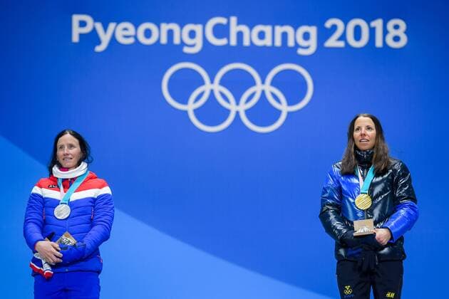 180210 Silver medalist Marit Bj ¿color of Norway and gold medalist Charlotte Kalla of Sweden at the medal ceremony for the Women s Team Sprint during the 2018 Winter Olympics on February 10 2018 in Pyeongchang Photo Jon Olav Nesvold BILDBYR N code JE 160152ö  Copyright: JONxOLAVxNESVOLD BB180210BB242