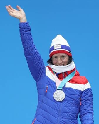 (180210) -- PYEONGCHANG, Feb. 10, 2018 -- Second placed Norway s Marit Bjoergen celebrates during the medal ceremony of the Ladies 7.5km + 7.5km Skiathlon of Cross-Country Skiing at the 2018 PyeongChang Winter Olympic Games Olympische Spiele Olympia OS at the Medal Plaza in PyeongChang, South Korea, on Feb. 10, 2018. ) (SP)OLY-SOUTH KOREA-PYEONGCHANG-CROSS-COUNTRY SKIING-LADIES 7.5KM+7.5KM SKIATHLON-MEDAL CEREMONY FeixMaohua 
